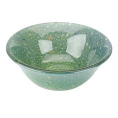 a green bowl with white squares in it