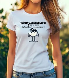 Add a touch of fun and nostalgia to your wardrobe with a tummy Ache Survivor T Shirt! Perfect for casual outings, parties, or as a quirky gift for friends and family. Tummy Ache, Cartoon Shirts, Retro Cartoons, Quirky Gifts, It Hurts, Gender Neutral, Art Collection, Bathing Beauties, Adult Outfits