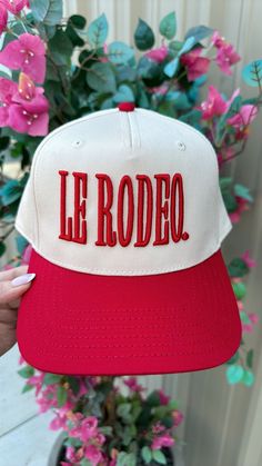 Lets head to "Le Rodeo!" Whether you're headed to a country concert, an actual rodeo, or running errands, this is the perfect hat to add a pop of color to your outfit! So cute styled with a white tee and denim! Collab with Caleigh Hardy! Twill cap Made in USA Embroidery at front and side panel Adjustable back strap Brim measures approx 3" in lengthOS measures approx 23.55" in circumference Caleigh Hardy, Usa Embroidery, Country Concerts, Country Concert, White Tee, Back Strap, Panel Siding, Rodeo, Running Errands