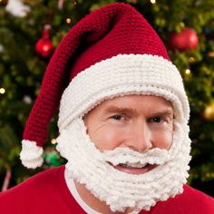 a man wearing a santa hat and beard