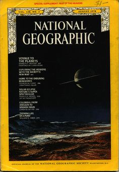 the front cover of national geographic magazine, with an image of saturn in the background