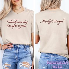 Get ready to be OBSESSED with your magic school shirt. It's the cutest and most trendy way to emit all those magical vibes! This is THE CUTEST election tshirt! Great as a potterhead gift! * Q U I C K * F A C T S * ✺ 100% preshrunk cotton ✺ Wash and dry normally (on cool for best results) * S I Z I N G * ✺ Models are wearing size XL for an oversized look ✺ Sizing is unisex so runs like men's, though not overly large ✺ Most women find their typical size works best, since they are meant to fit a to Cotton Fandom Short Sleeve Tops, Bookish Cotton Tops With Character Print, Cotton Fandom Tops With Text Print, Cotton Fandom Top With Text Print, Book Nerd Shirts, Nerd Shirts, Fan Shirts, Travel Shirts, School Shirts