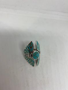 Lovely polished sterling silver has the look of Deco with turquoise inlaid dragonfly very detailed vintage filigree Size 6 We can size these with an additional $10-$20 fee for the jeweler All rings are shipped in a nice gift box. Check out our over a THOUSAND great reviews Engraving is $4 per letter and is not always perfect depending on the piece. It can take a few days if the jeweler is busy. This is payable to Paypal Judithsltd@gmail.com Unique Silver Turquoise Ring With Inlay, Bohemian Sterling Silver Butterfly Ring, Handmade Bohemian Sterling Silver Butterfly Ring, Bohemian Handmade Sterling Silver Butterfly Ring, Silver Bohemian Turquoise Ring Hallmarked, Bohemian Silver Turquoise Ring Hallmarked, Bohemian Silver Turquoise Ring With Inlay, Silver Butterfly Jewelry For Collectors, Antique Silver Butterfly Jewelry