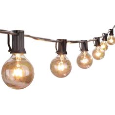 a string of clear glass globe lights on a white background