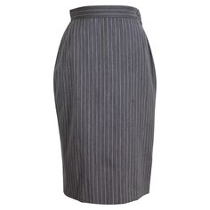 Mila Schon Boutique sheath skirt. Gray color with red pinstripe pattern. Side closure with zip and button. Internally it is lined. New without label. Made in Italy. Size 42 It 8 US 10 UK Waist skirt: 35 cm Length of the skirt: 68 cm Striped Knee-length Skirt For Work, Chic Pinstripe Skirt For Work, Striped Lined Skirt For Workwear, Fitted Striped Skirt For Workwear, Striped Lined Skirt Bottoms For Workwear, Pinstripe Vertical Stripes Skirt For Work, Fitted Striped Knee-length Bottoms, Fitted Pinstripe Skirt For Work, Fitted Striped Pencil Skirt