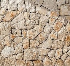 a stone wall that is made out of rocks