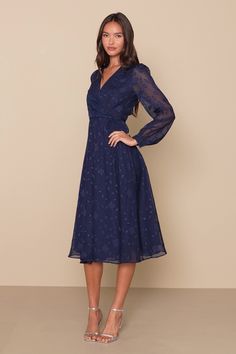 Classy and chic come together in perfect harmony to create the Lulus Evening of Elegance Navy Blue Floral Jacquard Wrap Midi Dress! Lightweight woven fabric, with a floral jacquard pattern, shapes this fabulous dress that has a surplice neckline and sheer long sleeves with button cuffs. Adjustable wrap silhouette, with tying waist sash and hidden internal ties, ends at a slightly ruffled midi hem. Fit: This garment fits true to size. Length: Mid-calf length. Size medium measures 47" from shoulde 22 Weeks Pregnant, Midi Dress Long Sleeve, Waist Sash, Surplice Neckline, Wardrobe Inspiration, Wrap Midi Dress, Dream Style, Wedding Rehearsal, Floral Jacquard