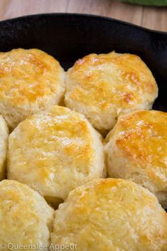 biscuits in a cast iron skillet on a wooden table