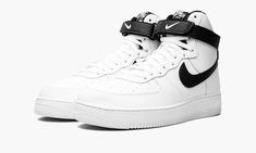 White/black leather Air Force 1 High '07 sneakers from NIKE featuring signature Swoosh logo detail, embroidered logo to the rear, round toe, front lace-up fastening, logo patch at the tongue, front touch-strap fastening, ankle-length, branded insole and rubber sole.  These styles are supplied by a premium sneaker marketplace.  Stocking only the most sought-after footwear, they source and curate some of the most hard to find sneakers from around the world. . White Black Shoes, Nike Air Force 1 High, Air Force 1 High, Stadium Goods, Mens Nike Air, Swoosh Logo, Shoe Art, Suede Material, Nike Air Force 1