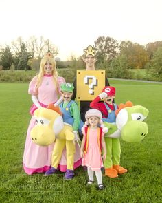 the family is dressed up as mario and princess peach