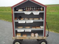 a wagon with donuts and other items on it