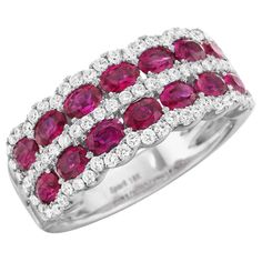 Add color to your jewelry with a ring you can wear everyday! Oval rubies are prong set along two rows, with round diamonds along the center and scalloped edges, make this a colorful take on a classic design. Rubies and diamonds are some of the hardest gemstones, and their durability makes them perfect for jewelry to put on and keep on day after day. Made in USA Also available in 18K Yellow Gold or Platinum Round Diamonds = .51 carats tw G-H Color / VS1-2 Clarity 14 Oval Rubies = 2.10 carats tw M Affordable Diamond Rings, Ruby Diamond Rings, Unique Diamond Rings, Jewelry Appraisal, Bridal Ring Sets, Diamond Engagement Ring Set, Ladies Diamond Rings, Round Diamond Engagement Rings, Ruby Jewelry