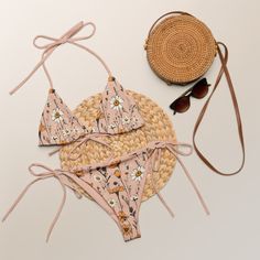 Stunning triangle beige bikini set with meadow flowers and beige lining is available in sizes up to 6XL. This bikini is made from recycled material.  Please check the sizing chart between the listing photos. Item description: - fabric composition in Latvia: 88% recycled polyester, 12% elastane, - fabric composition in Mexico: 81% recycled polyester, 19% Lycra spandex, - soft and stretchy material with UPF 50+, - sizes up to 6XL, - bikini top comes with removable padding for comfort, - multiple w Triangle Beachwear Swimwear For Vacation, Pink Triangle Swimwear For Spring, Triangle Swimwear For Sunbathing In Summer, Beachy Triangle Swimwear For Beach Season, Triangle Swimwear For Spring Vacation, Triangle Swimwear For Summer Vacation, Triangle Beachwear Swimwear For Beach Season, Triangle Swimwear For Beach Season Vacation, Triangle Swimwear For Spring Poolside