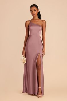 a bridesmaid in a strapless dress with high slits and side slit