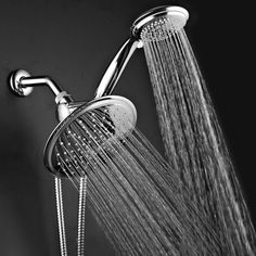 a shower head with water flowing from it