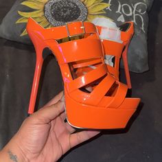 Are You A Real Life Barbie . If So You Need These Barbie Style Mule Platform Heel Sandals In Hot Orange Orange Is All The Rave This Season! Brand New Never Worn In Original Box! Shoe Is Labeled Size 9.5 But Fits Like A 9 With Standard Width (Someone Who Wears A Small 9 Or 8.5 Would Fit These Perfectly) I Brought These One Year Ago I Doubt You’ll Find Them Anywhere Else! Trendy Orange Open Toe Heels, Orange High Heel Sandals With Buckle Closure, Trendy High Heel Orange Sandals, Trendy Orange High Heel Sandals, Orange High Heel Synthetic Sandals, Orange Open Toe Sandals For Party, Orange Open Heel Sandals For Party, Orange Open Heel Synthetic Heels, Orange Synthetic Heels With Heel Strap