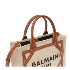 Balmain small beige B-Army hand bag, pin closure, inner open pocket, 2 straps, adaptable strap, frontal logo Composition: 58% Cotton, 42% Linen | Balmain Women's B-army Small Shopper in Beige | SS24 Khaki Shoulder Bag With Double Handles, Beige Coated Canvas Bag With Handles, Khaki Satchel With Adjustable Strap And Double Handle, Beige Coated Canvas Bags With Handles, Beige Coated Canvas Bag, Khaki Double Handle Satchel With Adjustable Strap, Khaki Top Handle Bag With Handles, Designer Beige Tote Satchel, Luxury Medium Beige Bags