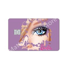 a purple credit card with an image of a woman's eye and eyelashes on it