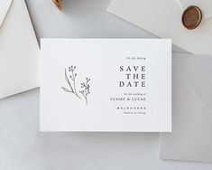 save the date cards on top of envelopes