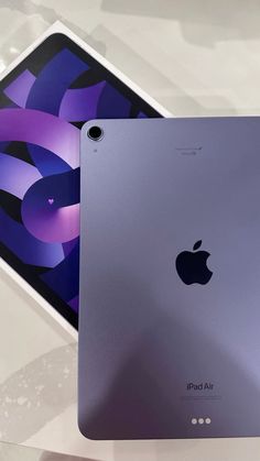 an apple ipad is shown next to another one