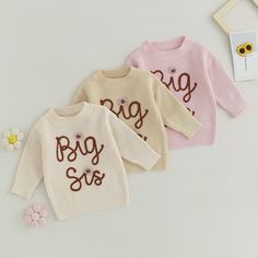 For the best LIL SIS and BIG SIS team, this oversized knitted sweater is a perfect matching top for your princesses. Featuring the cutest colors and darling knitted details, this will absolutely be a big hit with your daughters! Cute Long Sleeve Knitted Top, Knit Long Sleeve Sweater With Letter Print, Knit Sweater With Letter Print And Long Sleeves, Cute Knitted Acrylic Tops, Cute Oversized Letter Print Sweater, Cute Oversized Chunky Knit Sweater, Oversized Cute Sweater With Letter Print, Cute Soft Knit Acrylic Sweater, Cute Acrylic Soft Knit Sweater