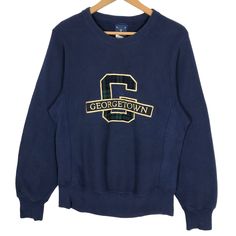 Vintage 90s Georgetown University Hoyas crewneck sweatshirt in navy blue colour. Pullover sweater with embroidered logo on the front. Still in good condition. SEE THE PICTURES FOR MORE DETAILS. CONDITION : 9/10 MEASUREMENT Pit : 20.5 inch Length : 28 inch Shoulder : 16 inch Arm Length : 27 inch Size On Tag : S Recommended Size : S PAYMENT We accept PayPal only. The item will be ship 3-5 days once the payment has been made. NORMAL SHIPPING FEDEX USUALLY AROUND 7-21 DAYS BEFORE REACH THE DESTINATI Crew Neck Streetwear Sweater With Embroidered Logo, Crew Neck Sweater With Embroidered Logo For Streetwear, Streetwear Sweater With Embroidered Logo, Navy Long Sleeve Sweatshirt With Embroidered Logo, Navy Crew Neck Sweater With Embroidered Logo, Navy Long Sleeve Sweater With Embroidered Logo, Blue Crew Neck Sweatshirt With Embroidered Logo, Navy Varsity Long Sleeve Sweatshirt, Navy College Sweater