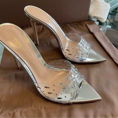 Gianvito Rossi Silver Halley 105 Heeled Mules! Never Worn, Brand New, With Box, And Dust Bag. Excellent Condition. Never Worn. Size 7 - Open Pointed Toe - Heel: H4in - Leather Sole -Transparent Vinyl Luxury High Heel Wedding Shoes For Summer, Luxury Embellished Pointed Toe Heels, Luxury Open Heel Cocktail Heels, Elegant Open Heel Heels For Events, Luxury Pointed Toe Heels For Gala, Luxury Heels With Padded Heel For Cocktail, Cocktail Wedding Shoes With Wrapped Heel, Luxury Heels With Wrapped Heel For Cocktail, Luxury Cocktail Heels With Wrapped Heel