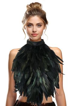 a woman wearing a black top with feathers on it