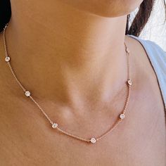 "Our stunning cubic zirconia necklace is the perfect to layer up with your favorite everyday pieces. Featuring eye-catching shiny circular cubic zirconia discs that are stationary evenly spread out on a delicate chain. DETAILS & SIZE *The listing is for one cubic zirconia necklace *Available in 14kt gold,rose gold plating over sterling silver or sterling silver chain and findings *Adjustable length choker will have a 1\" extension chain Lengths: 16\" + 2\" extender *Every purchase comes in a Tan Rose Gold Cubic Zirconia Round Necklace, Rose Gold Cubic Zirconia Necklace, Round Cubic Zirconia Diamond Necklace, Round Diamond Necklace With Clavicle Chain, Dainty Rose Gold Cubic Zirconia Diamond Necklace, Delicate Diamond Clavicle Necklace, Delicate Clavicle Chain Diamond Necklace, Rose Gold Round Diamond Necklace With Clavicle Chain, Cubic Zirconia Diamond Necklace With Adjustable Chain