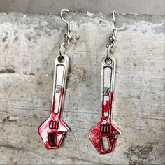 Very Cool And Stunning Wrench Dangle Earrings. They Are Silver In Color With Red Markings That Resemble Blood On The Wrench Length Of Earring: 1.5 Inches (Approximate) Height Of The Pendant: 1.2 Inches (Approximate) Width Of The Pendant: 0.5 Inches (Approximate) Weight: 0.5 Ounces Fashion Jewelry, Boho Jewelry, Hippie Jewelry, Handmade Jewelry, Unique Earrings, Indian Jewelry, Silver Earrings, Gift For Her, Tribal Jewelry Shipping This Item Is Ready To Ship Within 1-2 Business Days From The Time Skull Earring, Creepy Earrings, Earrings Gothic, Funny Earrings, Punk Earrings, Special Halloween, Halloween Style, Earrings Halloween, Gothic Earrings