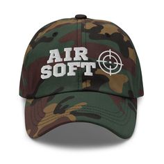 Airsoft themed embroidered hat for men and women. This one's got a low profile with an adjustable strap and curved visor. * 100% chino cotton twill * Green Camo color is 35% chino cotton twill, 65% polyester * Unstructured, 6-panel, low-profile * 6 embroidered eyelets * 3 ⅛" (7.6 cm) crown * Adjustable strap with antique buckle Once your order is placed I am sorry there is no cancelation since your order goes into production right away. This product is made especially for you as soon as you place an order, which is why it takes us a bit longer to deliver it to you. Making products on demand instead of in bulk helps reduce overproduction. Camouflage Hat, Embroidered Hat, Hat For Men, Camo Colors, I Am Sorry, Embroidered Hats, Hat For Man, Green Camo, Trucker Cap