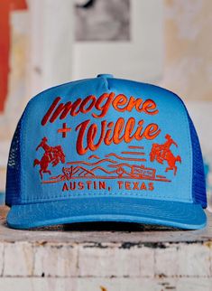 the "bronco" trucker in blue – imogene + willie Blue Retro Adjustable Trucker Hat, Retro Blue Adjustable Trucker Hat, Vintage Blue Adjustable Trucker Hat, Retro Blue 5-panel Trucker Hat, Trucker Hat With Curved Bill For Rodeo, Vintage Blue Trucker Hat With Flat Bill, Vintage Blue Trucker Hat With Flat Brim, Vintage Style Trucker Hat For Rodeo, Vintage Trucker Hat For Rodeo