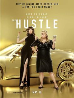 two women standing in front of a gold car with the words hustle on it