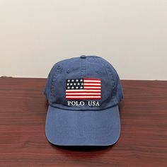 Brand - Ralph Lauren Polo Hat Type - Dad Hat Color - Blue Condition- Brand New Gender - Unisex Usa Flag Blue Casual Hat With Short Brim, Casual Blue Hat With Short Brim, Casual Blue Flat Brim Hat, Classic Blue Baseball Cap For Summer, Blue Flat Bill Hat For Beach, Blue Cotton Hat With Short Brim, Blue Flat Bill Beach Hat, Classic Blue Cap Hat, Blue Cotton Flat Brim Baseball Cap