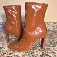 Steve Madden Leana Patent Heeled Boots In Cognac Per Steve Madden - The Color Is As Close To Accurate As Possible But Will Vary In Different Light Settings - I Would Call These A Warm Milk Chocolate Fondue Color - Inner Zip Closure - Brand New - No Box - No Tags - Heel Height Is 4” - Approx 4.6-4.7” Across Flattened Leg Opening (Top) - Some Very Mild Shelf Wear On Bottoms As Pictured - Synthetic Upper - Fabric/Synthetic Lining - Synthetic Sock - Manmade Outsole - Size 7m Fall Square Toe Heeled Boots With 4-inch Heel, Fall Heeled Boots With 4-inch Square Toe, Fall Heeled Boots With 4-inch Heel And Closed Toe, Fall Heels With 4-inch Square Toe, Fall Brown Heels With Sculpted Heel, Spring Brown Heeled Boots With Padded Heel, Brown Sculpted Heel Heels For Fall, Brown High Heel Boots With Padded Ankle, Brown Boots With 4-inch Heel And Medium Width