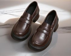 With their comfortable barefoot Mary Jane style, these shoes are designed for all-day wear without sacrificing fashion. For a wedding or for a dress shoe, our Women's Oxford Shoes are the ideal choice. Available in either faux leather brown or black, they effortlessly complement any outfit. Crafted with high-quality materials, these shoes not only look elegant but also provide unrivaled comfort. The platform 6 cm heel offers just the right amount of lift, enhancing the posture and elongating the legs. Size Guide 35: 22.5 cm (8.86 inches) 36: 23 cm (9.06 inches) 37: 23.5 cm (9.25 inches) 38: 24 cm (9.45 inches) 39: 24.5 cm (9.65 inches) 40: 25 cm (9.84 inches) Elegant Closed Toe Platform Loafers, Formal Slip-on Leather Shoes With Reinforced Heel, Brown Platform Loafers For Formal Occasions, Formal Platform Loafers With Pointed Toe And Reinforced Heel, Formal Platform Loafers With Round Toe, Formal Platform Loafers With Reinforced Heel And Pointed Toe, Elegant Business Platform Loafers With Almond Toe, Elegant Leather Platform Shoes, Elegant Almond Toe Platform Loafers For Business