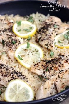 lemon basil chicken and rice in a skillet with lemon slices on the side, ready to be eaten