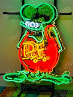 a neon sign with an image of a cartoon character in the shape of a frog