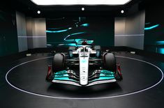 the mercedes formula car is on display at the museum