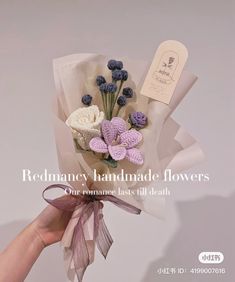 a person holding a bouquet of flowers with the words redmany handmade flowers on it