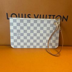 Autentic Lv Neverfull Pochette New , Never Used Very Cute Luxury White Pouch For Daily Use, Designer White Pouch Clutch, Luxury Clutch For Daily Use With Silver-tone Hardware, Luxury White Clutch Pouch, Designer White Clutch For Everyday Use, Designer White Clutch For Daily Use, Louis Vuitton Strap, Louis Vuitton Eva Clutch, Damier Azur Neverfull