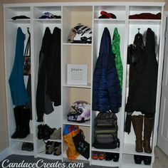 a closet filled with lots of coats and shoes