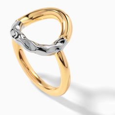 The classic eternity circle gets an elevated look with the molten asymmetric circle ring, featuring a subversive-basic design and clean, lightweight lines. Asymmetric metals deconstructed form a statement silhouette, perfect for any occasion.


Details












Band Tidth: 17.3mm
Band Thickness: 2mm
Material: 18k Gold & Rhodium Plated Modern Hoop Rings Tarnish Resistant, Circle Ring, Whimsical Fashion, Stackable Ring, Everyday Jewelry, Stackable Rings, Glass Window, Rhodium Plated, Two Tone