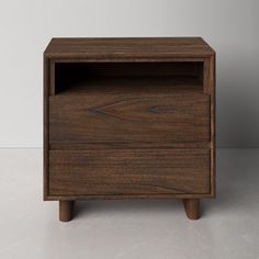 a wooden cabinet with two drawers on one side and an open drawer on the other