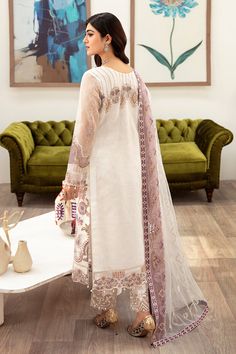 Brand: RamshaProduct Code: Minhal Vol-10 M-1002Collection: Minhal by Ramsha Luxury Collection Volume 10Fabric: Organza DETAILS Embroidered Organza front with sequence Embroidered Organza back Embroidered neckline patch with handmade Embroidered Organza sleeves with pasting Embroidered organza sleeves lace Embroidered organza ghera lace Embroidered Net dupatta Raw Silk trouser – 2.5 Meter Embroidered organza trouser patches DISCLAIMER:* Lining, Laces, and Tassels are not included in unstitched va Pakistani Designer Clothes, Organza Sleeves, Embroidered Organza, Silk Trousers, Embroidered Neckline, Net Dupatta, Pakistani Designers, 3 Piece Suits, Fabric Stores Online