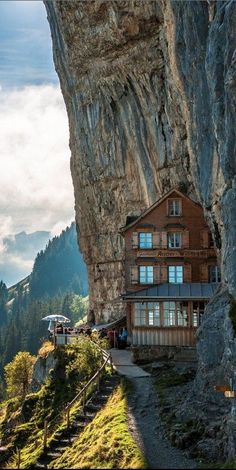 a house built into the side of a cliff