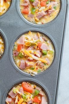 four muffin tins filled with different types of food in them and ready to be baked