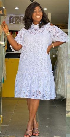 African women lace gown designed with black lace fabrics which makes it to be unique and sexy for any occasions.  fit: casual dresses color: white range: plus size and curves, tall style: casual, streetwear fabric: african inspired silk, mixed print gender: for her material: fabric, textile occasion: evening wear, wedding and ceremony African Dresses For Women Plus Size, White Lace Dress Short, Nigerian Lace Styles Dress, African Fabric Dress, African Dresses For Kids