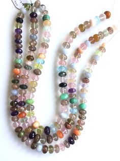 Multiple Gemstone Faceted Ball Beads Gemstone Necklace Weight: 380.00 Carats Approx Size: 10 To 12 MM Strands: 1\ Per Quantity Length: 16 Inches S H I P P I N G & R E T U R N P O L I C Y We offer FREE SHIPPING Worldwide. For Express Delivery Upgrade, Choose the Option on the checkout page. Return Policy: We accept RETURN & EXCHANGE Multicolor Rondelle Beaded Necklaces With Natural Stones, Multicolor Beaded Necklaces With Stones, Multicolor Multi-stone Beads And Cabochons For Jewelry Making, Multicolor Multi-stone Beads For Jewelry Making, Multicolor Round Beads Necklace With Stones, Multicolor Stone Round Beaded Necklace, Spiritual Rondelle Gemstone Beaded Necklaces, Rondelle Multicolor Natural Gemstones, Multicolor Oval Beaded Gemstone Necklaces