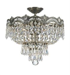 a crystal chandelier hanging from the ceiling